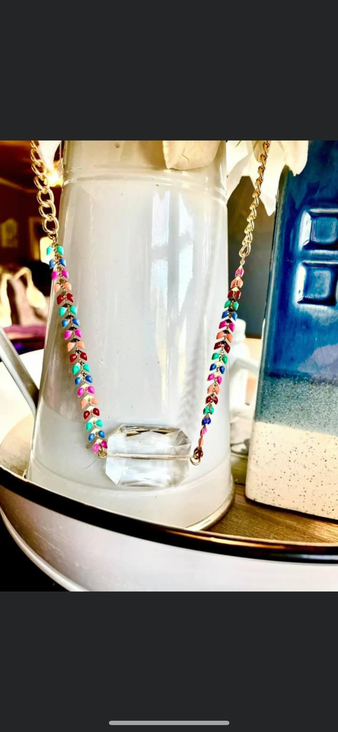 Multi color necklace with large clear focal point charm